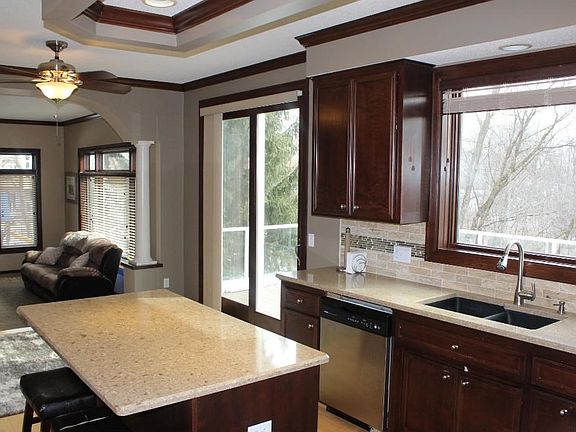 New Cambria Countertops w/ SS appliances.