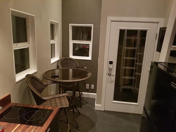 Small table and chair not shown included in furnishing, (table shown is included but is outside in patio)