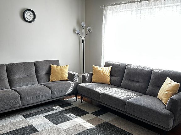 Another view of the living room with modern furnishings