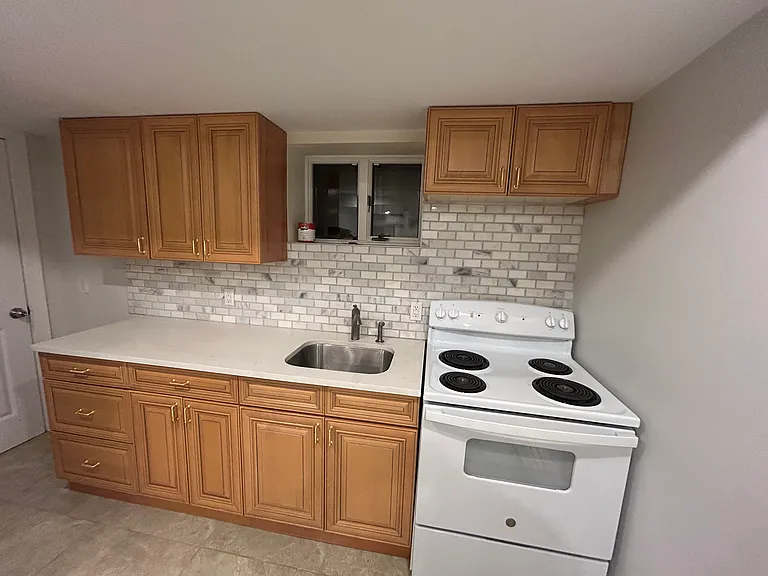 New backsplash , custom design cabinets