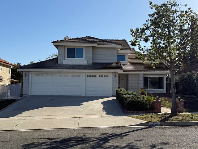 Front of Home w/Three Car Garage