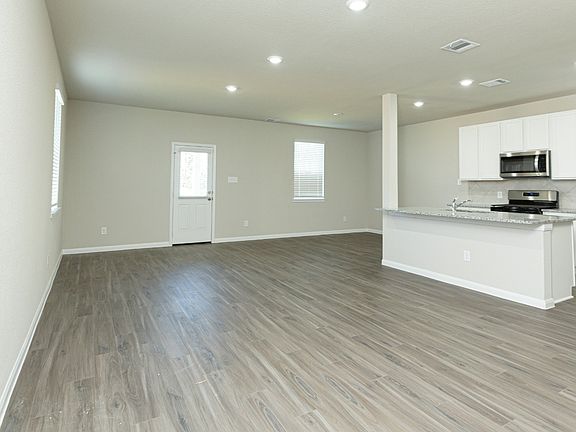 Family Room to Kitchen and Dining Area