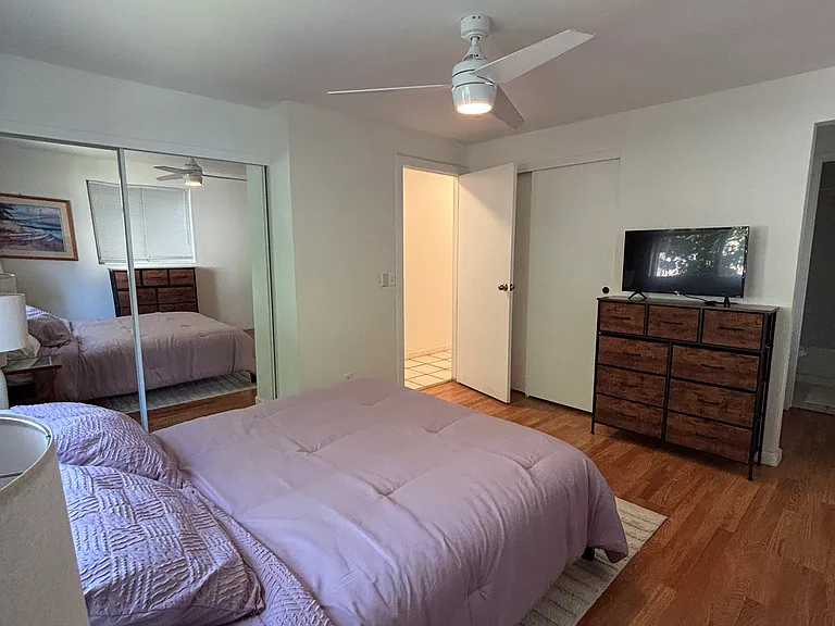 Master bedroom with 2 large closets and attached bathroom