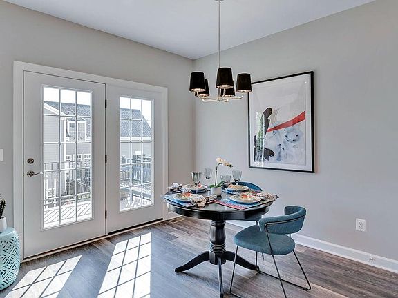Large dining area with french doors leading to a 8' by 20' Trex deck!