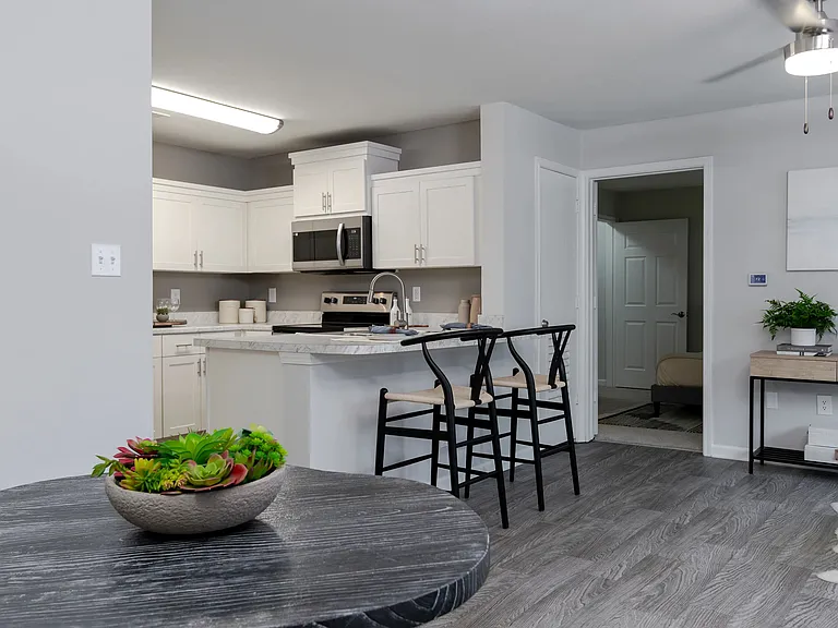 Savor the beauty of open living and dining in our easy flow floor plans.