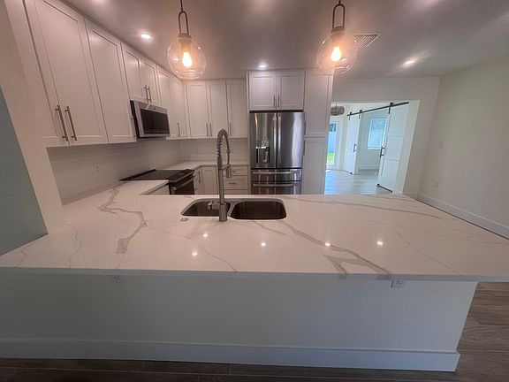 3rd image of 7818 Causeway Blvd N