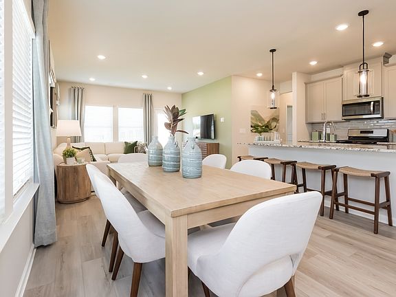 Dining area in the Roswell floorplan at a Meritage Homes community in Atlanta, GA.