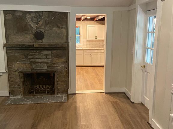 Living room looking into the kitchen.