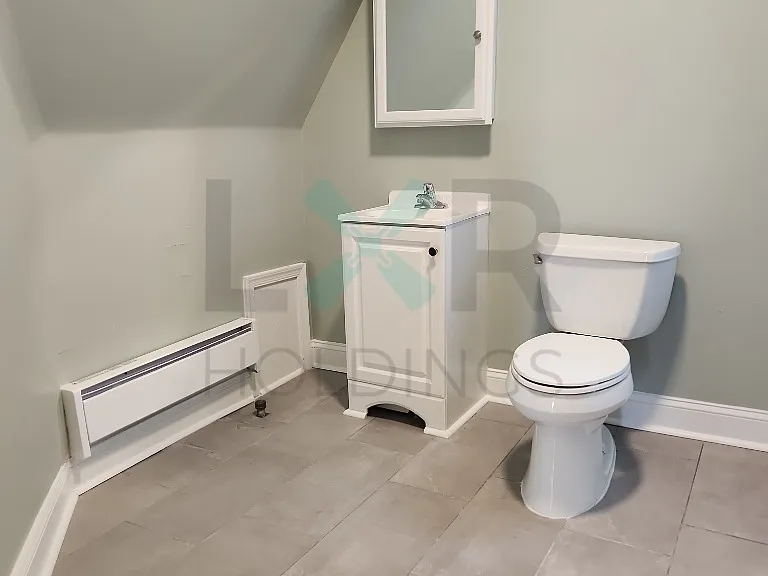 1015 Woodland Ave — Photo 6