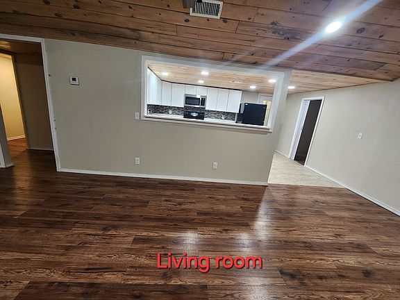 Living room open to kitchen.