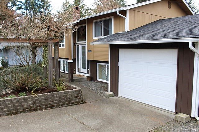 Privacy at the end of a cul-de-sac tastefully updated with newer roof, vinyl windows and exterior paint.  Room to park several vehicles and even a small RV or boat.