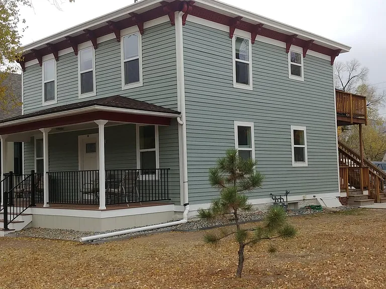 Front and side of house, parking behind