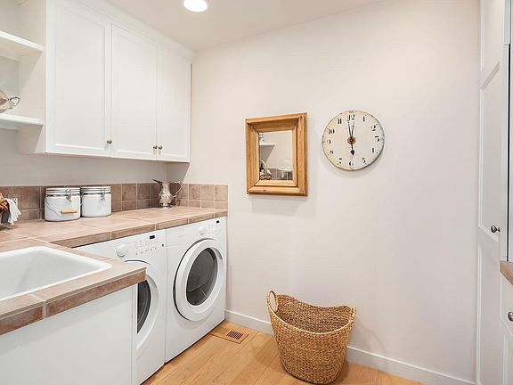 Convenient main floor laundry and utility.