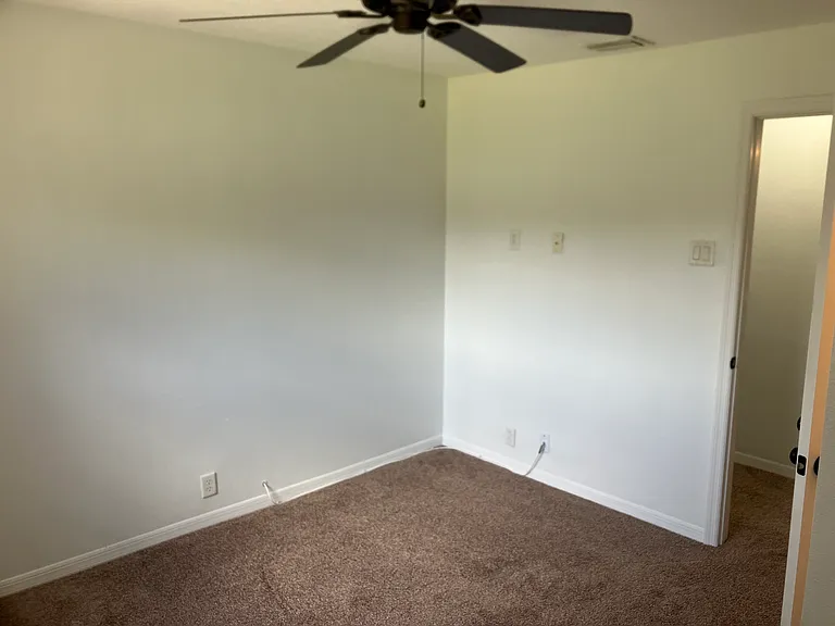 Third bedroom photo 3 of 3 can accommodate two twin beds with nightstands and dresser