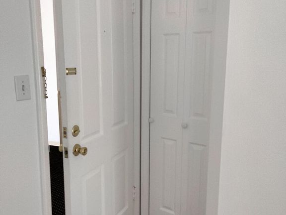 Front door with entrance closet