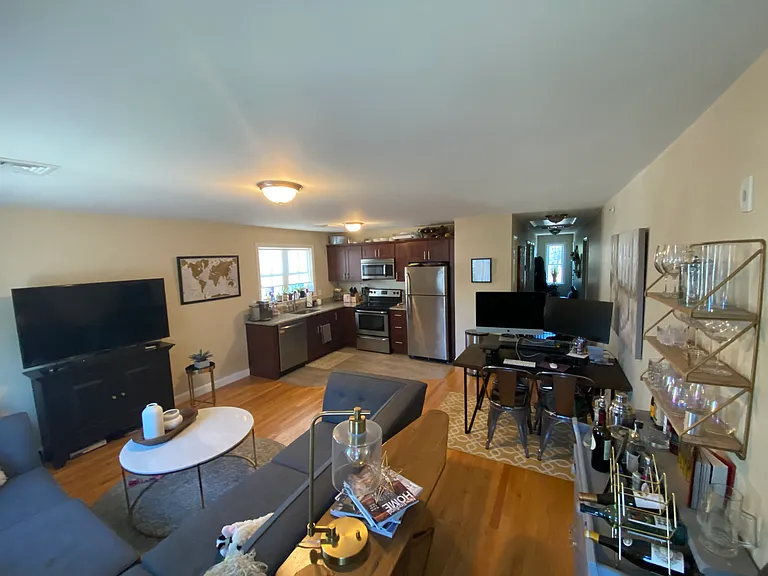 Lots of sunshine with an open concept floor plan for kitchen and living area.