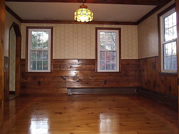 dining room w/ pine flooring