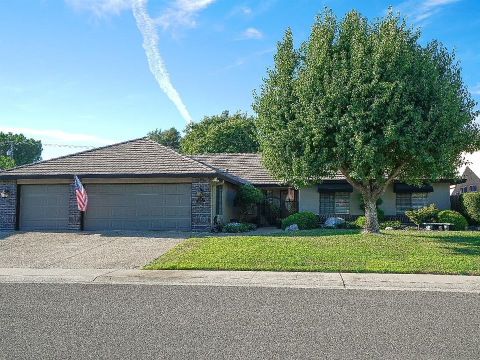 Welcome Home! Enjoy the Mature Landscaping this Lovely Home has to offer. Mature Bartlett Pear Trees and a variety of Well Manicured shrubs fill the yard. Exposed Aggregate, Stamped Concrete Driveway, Sidewalks and Patio make this a Complete Outdoor Package! The 3 Car Garage boasts Custom Cabinets, Workbench and Built in Speakers.