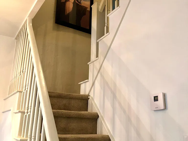 Upstairs lead to the bedrooms and bonus office /reading nook /workout areas.