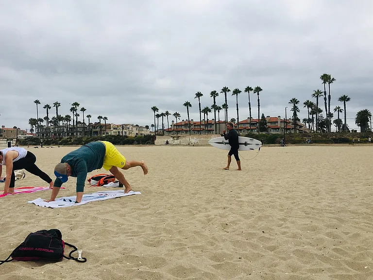 FREE or donation-based FUN Yoga at 9 a.m. daily on the beach in front of this ocean front complex of 42 units/owners.