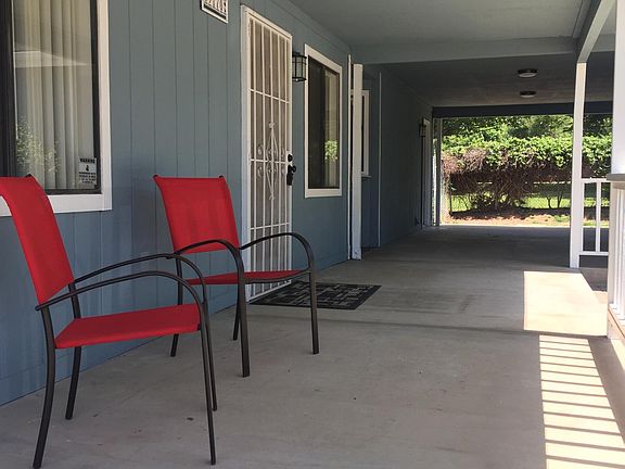 Huge covered front porch and entrance...plenty of space to entertain yourself and others!