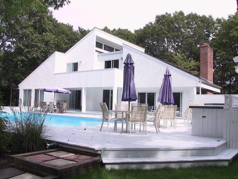 large deck with heated pool