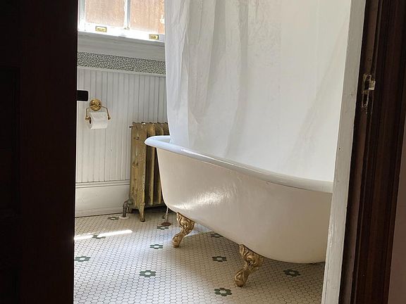 Second floor bathroom with clawfoot tub