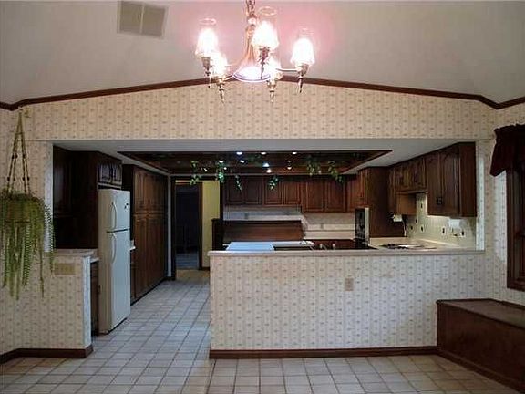 Hearth Room: View from the Hearth Room Fireplace back to the Kitchen.