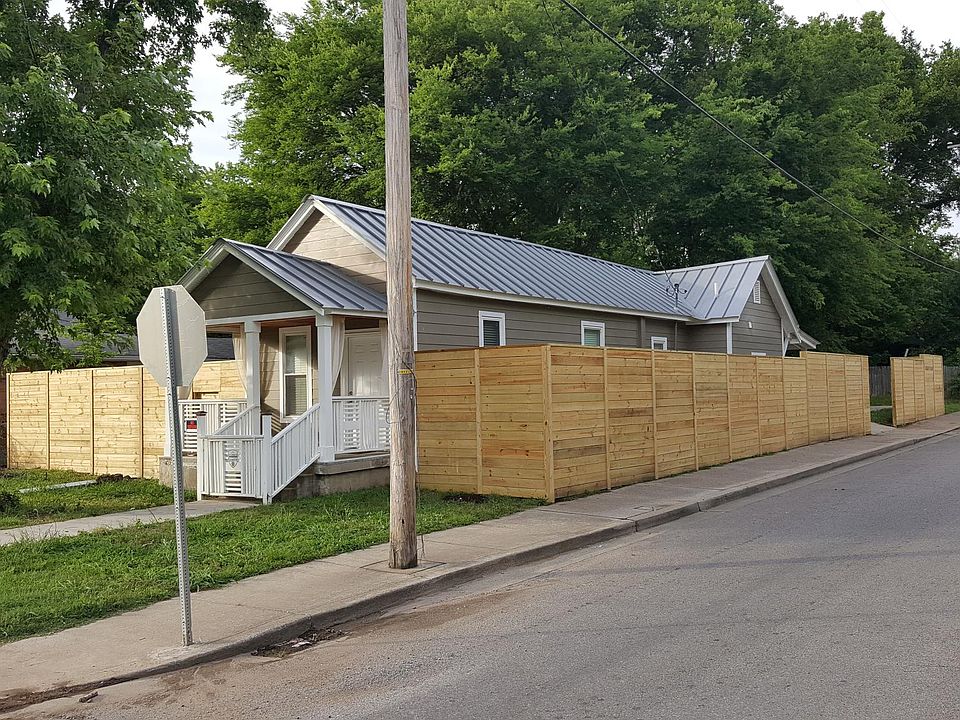 Front View showing 8' high privacy fence.
