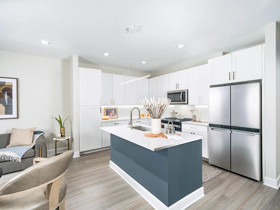 Unleash your inner chef at Modera Waugh! Enjoy a spacious chef's island with ample storage and an ENERGY STAR_ stainless-steel appliance package, perfect for culinary creations.