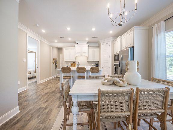 Dining area in the Decatur floorplan at a Meritage Homes community in Gulfport, MS.