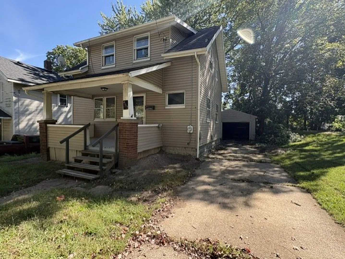 Spacious 3-Bedroom / 1 Bathroom Akron Home with Garage & Basement $1,250/Month — Photo 2