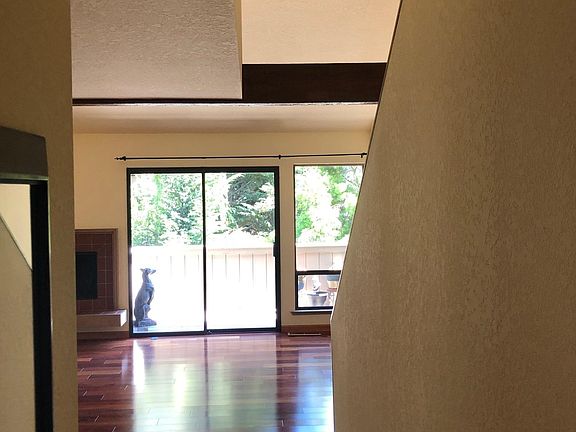 View as you enter, fireplace on the left.