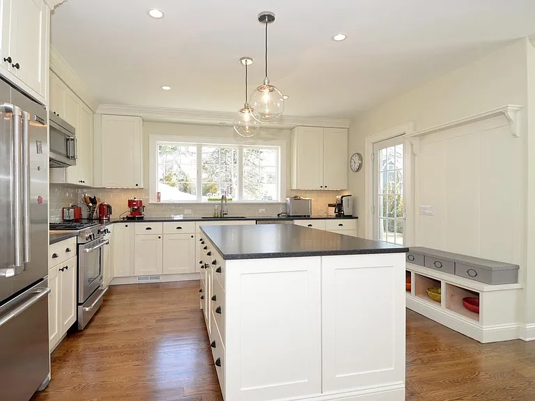 Kitchen door leads to backyard