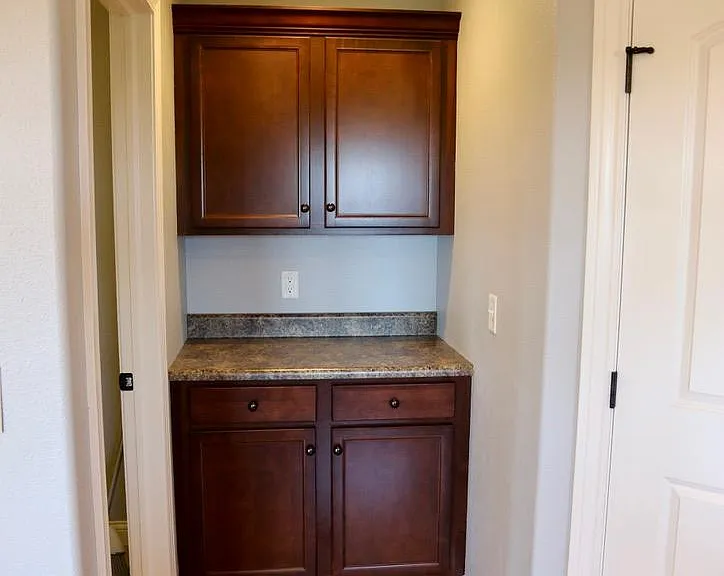 Keys and mail station (when entering through garage, enter into laundry room and then into kitchen/mail station on left upon entry)