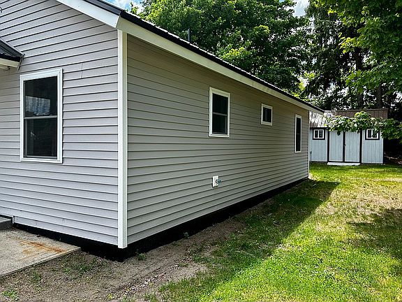 Right side of the house.