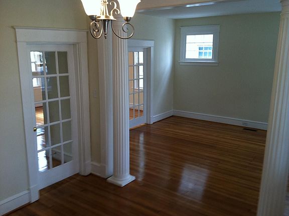 Stately columns separate the large living room and foyer!