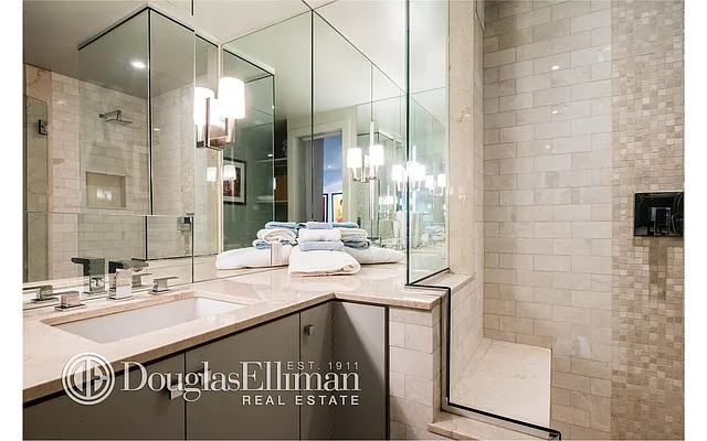 Sold by Douglas Elliman | media 18