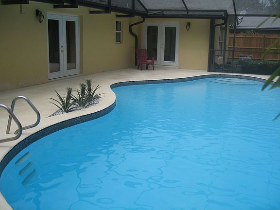 French Doors Open to Pool Area!