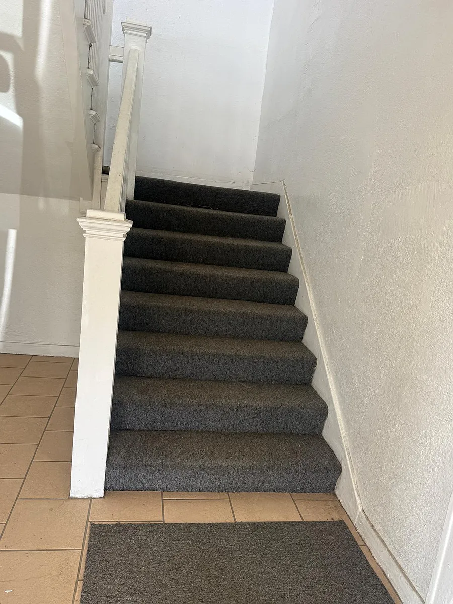 Stairs leading up to apartment - 5939 Northside Dr #3