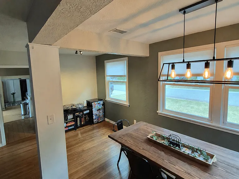Space for a full dinner table and natural lighting towards the front of the house