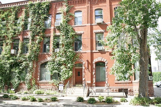 Great condo with exposed brick, lots of large windows 