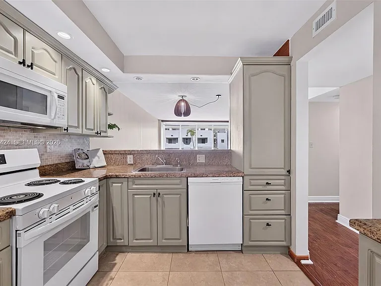 8233 Harding Ave #208 — Photo 4