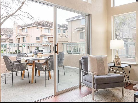 Living room and patio to balcony