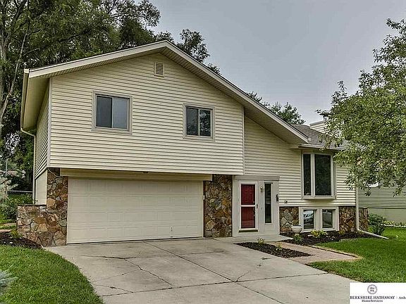Faces East, permanent siding, fully fenced yard.
