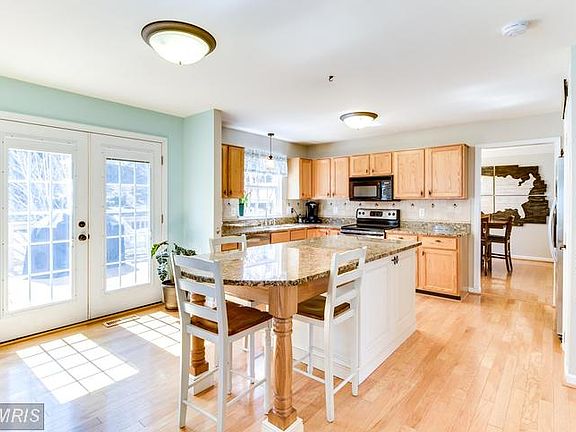 Extended Kitchen Island, French Doors to Deck