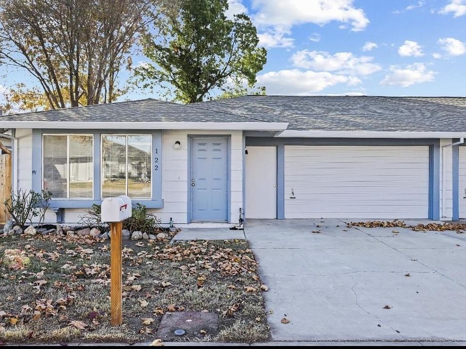 Unit 122 Exterior with 2 car garage
