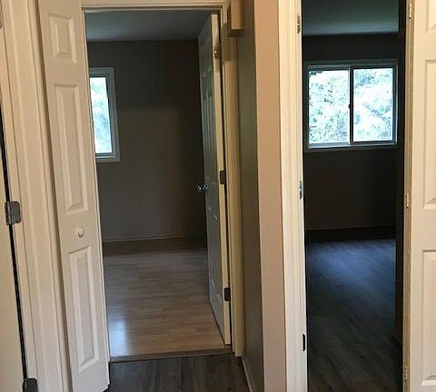 Hallway looking into both bedrooms
