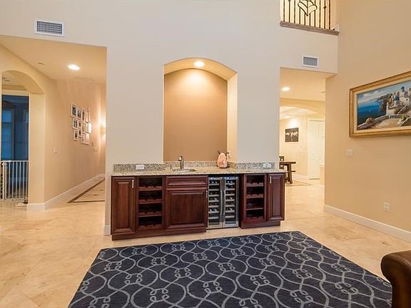 Easy to entertain in the spacious and open Great Room with built-in wine cooler and buffet.