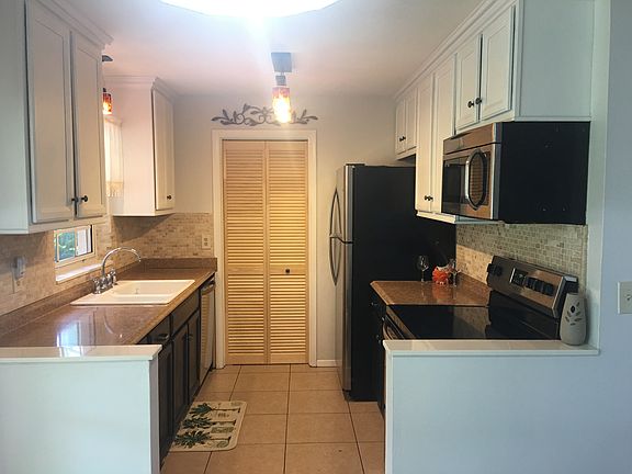 all new cabinets & pine door